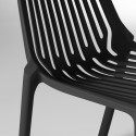 Chaise design en plastique avec dossier ajouré