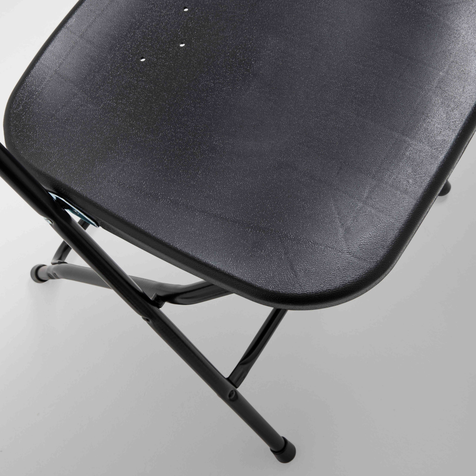 Chaise pliante en plastique noir