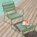 Ensemble fauteuil de terrasse bas et repose-pied en métal