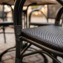 Chaise bistrot parisien en aluminum et rotin synthétique avec accoudoirs