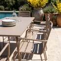 Table de terrasse en métal 180x90 cm et 8 chaises avec accoudoirs